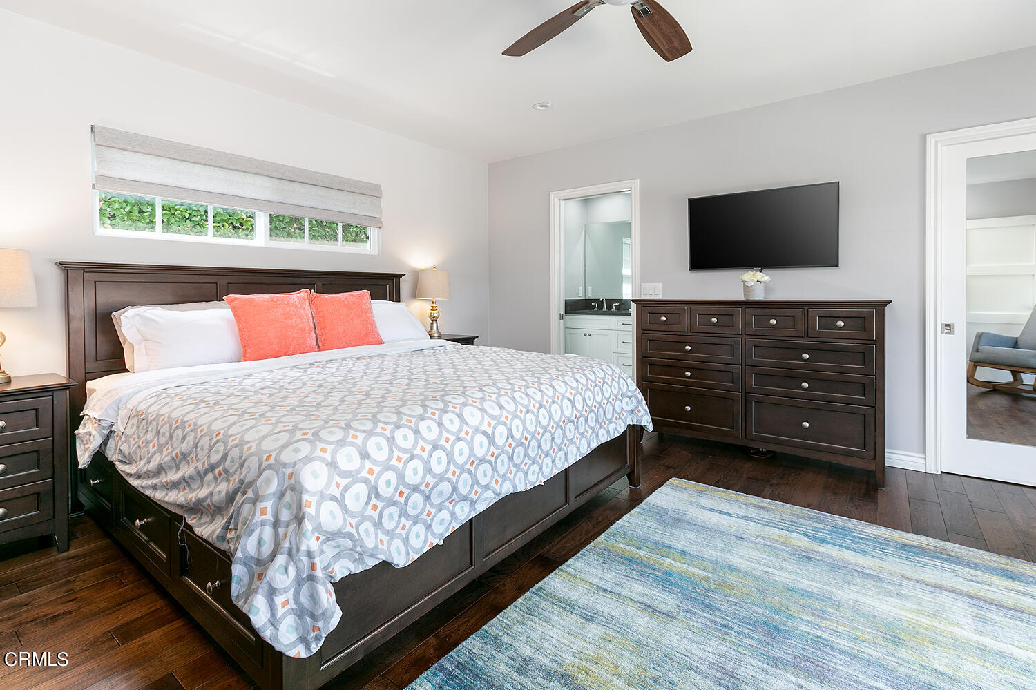 2375 East Woodlyn Road Pasadena, CA 91104 - Photo 18 of 33 a bedroom with a bed and a flat screen tv