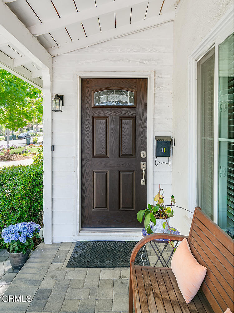 2375 East Woodlyn Road Pasadena, CA 91104 - Photo 5 of 33 a front view of a house with a garden