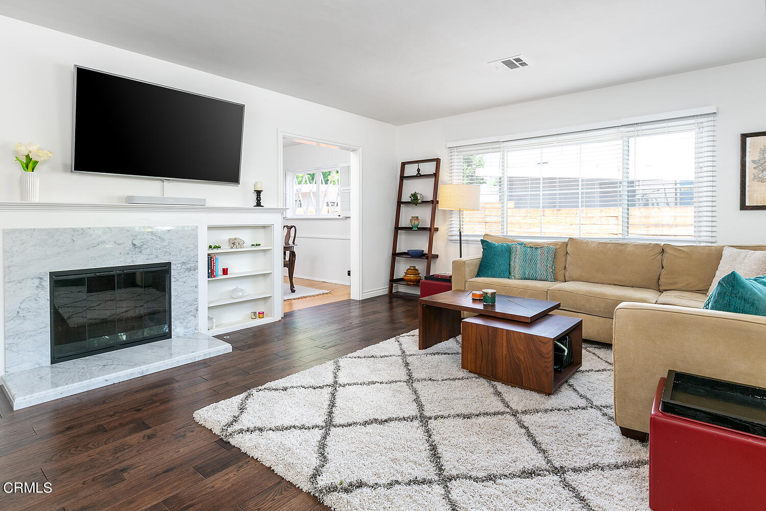 2375 East Woodlyn Road Pasadena, CA 91104 - Photo 7 of 33 a living room with furniture and a flat screen tv