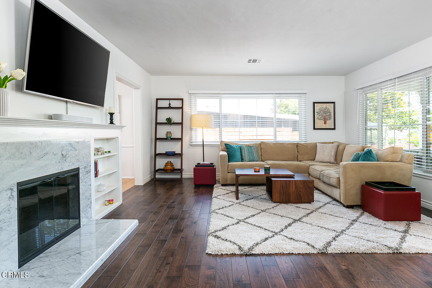 2375 East Woodlyn Road Pasadena, CA 91104 - Photo 9 of 33 a living room with furniture and a fireplace