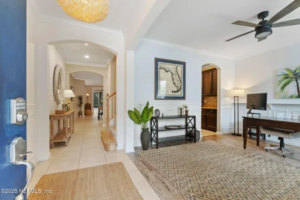 a living room with furniture and a table