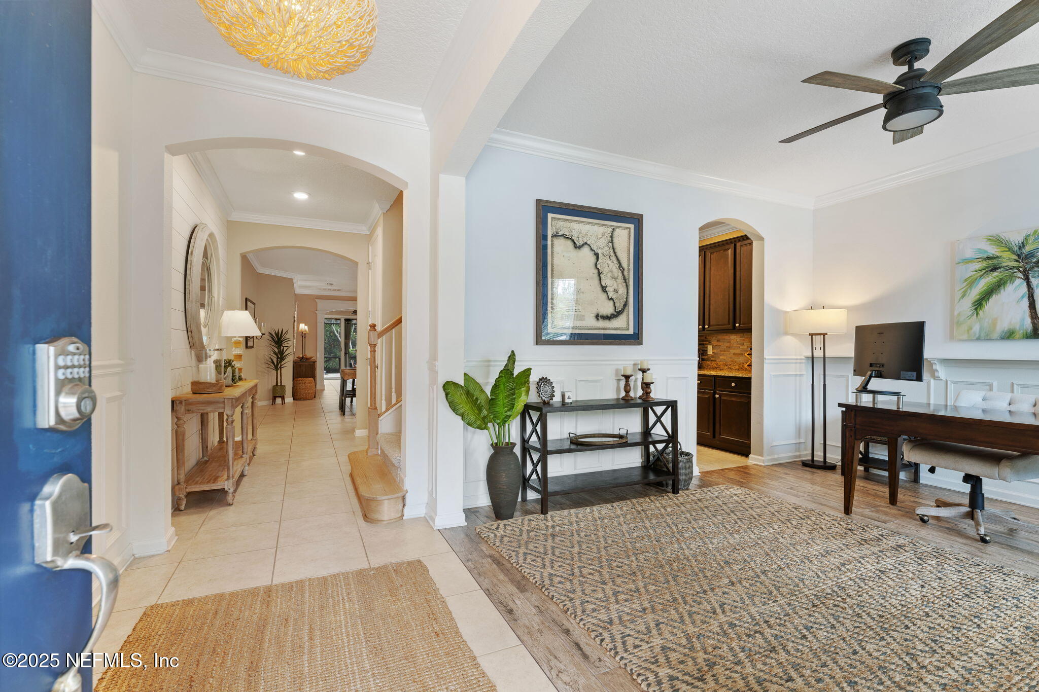 a living room with furniture and a table