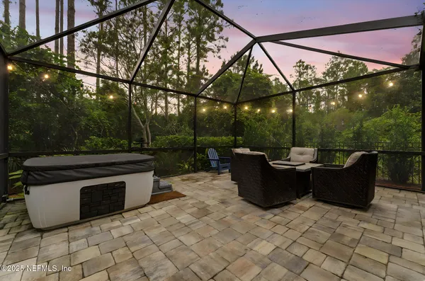 a view of a patio with a yard