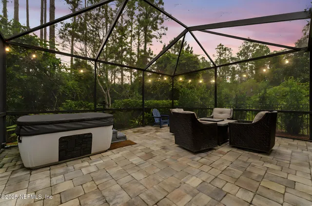 a view of a patio with a yard