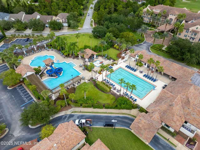 an aerial view of a house having yard