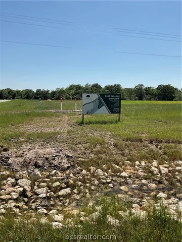 a view of a lake with a city