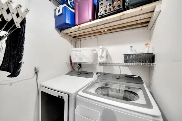 a yellow house with trees in front of it