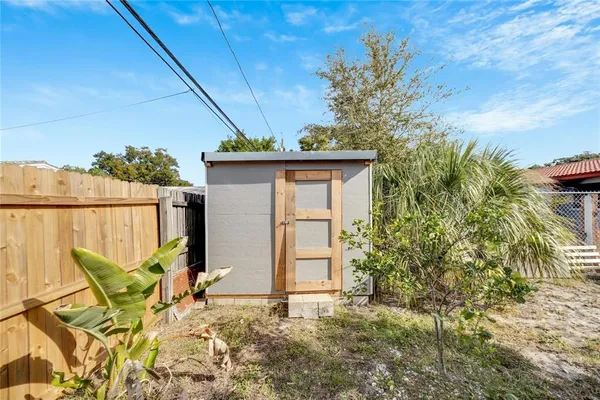 a backyard of a house with seating space
