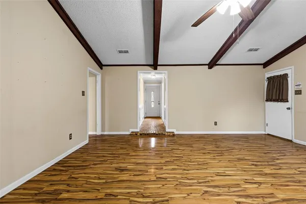 a large kitchen with stainless steel appliances granite countertop a stove a sink dishwasher and cabinets