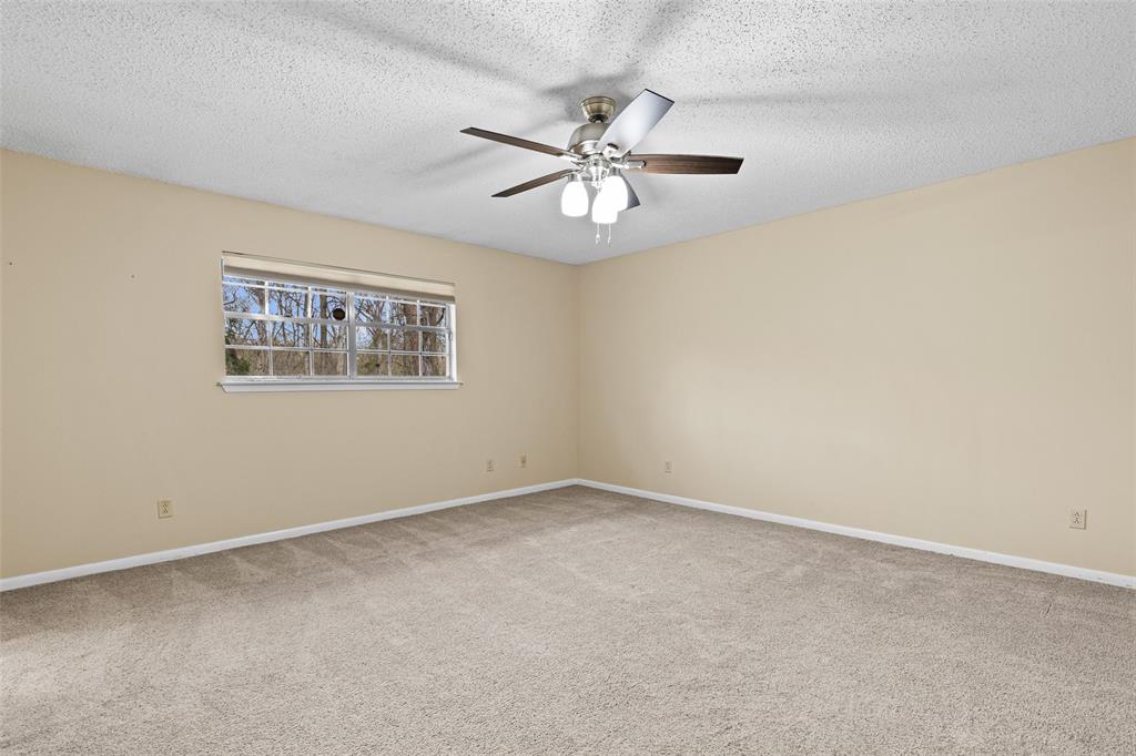 3215 Restview Street Longview, TX 75605 - Photo 27 of 40 a view of an empty room with a window