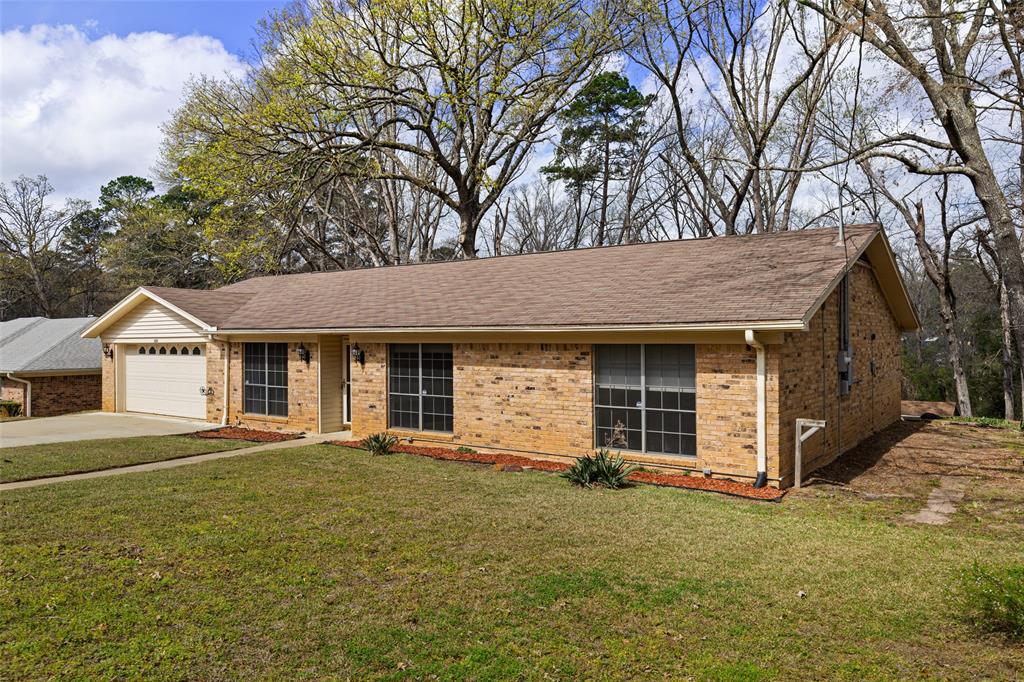 3215 Restview Street Longview, TX 75605 - Photo 3 of 40 front view of a house with a yard