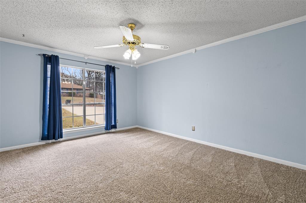 3215 Restview Street Longview, TX 75605 - Photo 7 of 40 a view of an empty room with a window