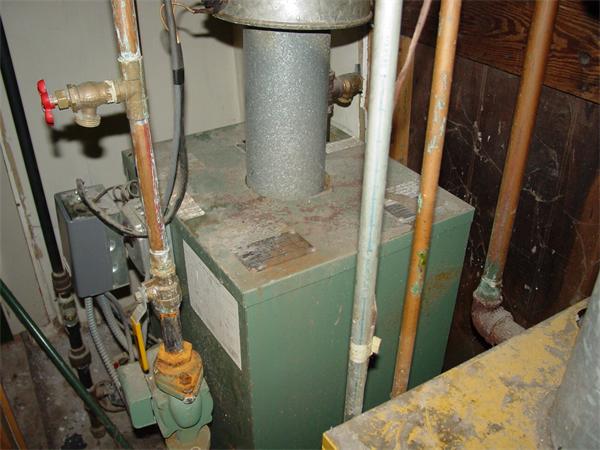 210 4th Street Fall River, MA 02721 - Photo 23 of 27 a bathroom with a sink a toilet and shower