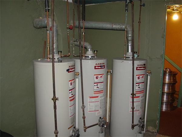 210 4th Street Fall River, MA 02721 - Photo 26 of 27 a close up of a utility room with dryer and washer