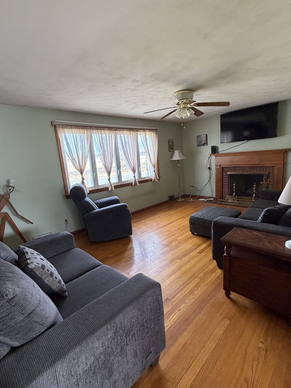 129 Fernbank Road Springfield, MA 01129 - Photo 11 of 24 a living room with furniture and a flat screen tv