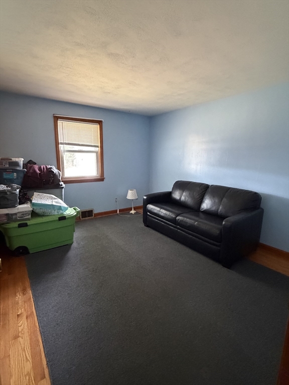 129 Fernbank Road Springfield, MA 01129 - Photo 12 of 24 a living room with furniture pool table and a window