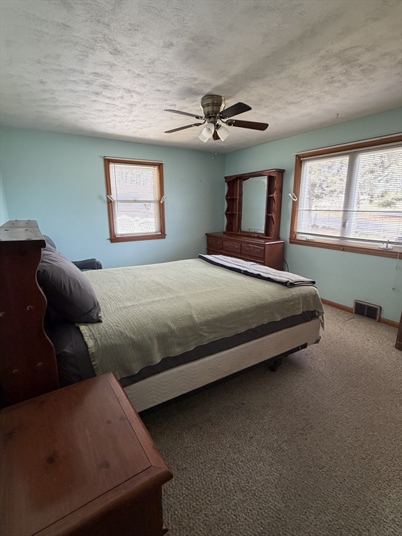 129 Fernbank Road Springfield, MA 01129 - Photo 13 of 24 a bedroom with bed and window