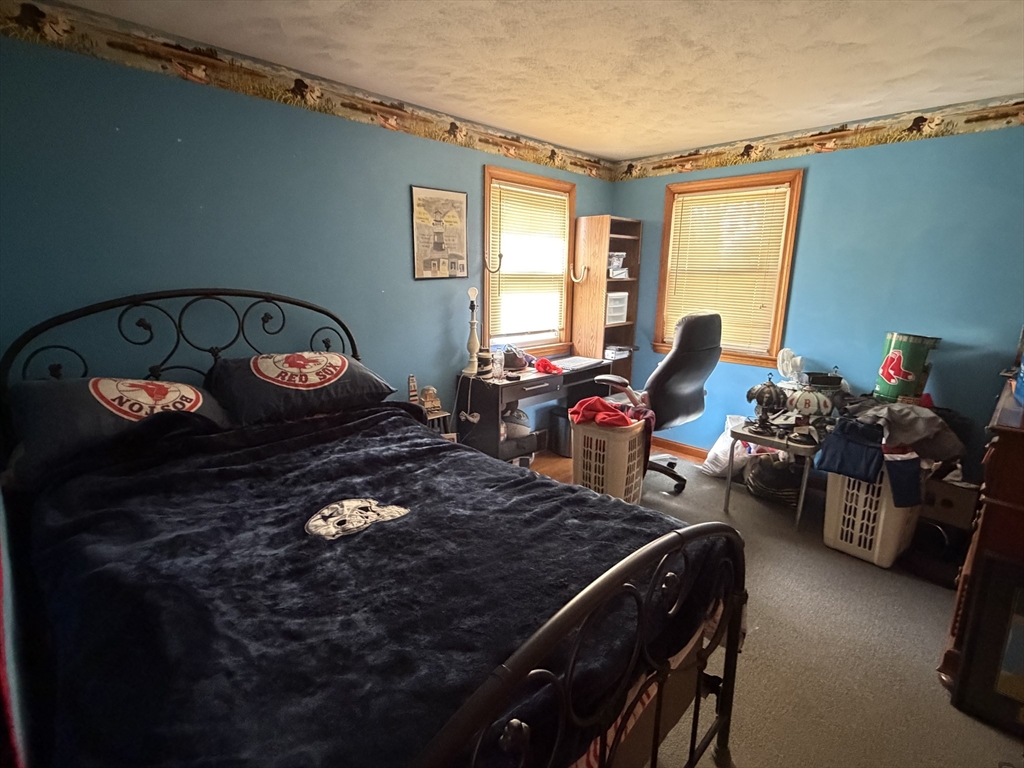 129 Fernbank Road Springfield, MA 01129 - Photo 15 of 24 a living room with furniture and a window