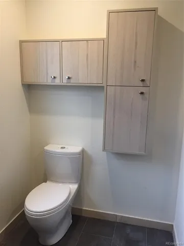 a bathroom with a toilet and a sink