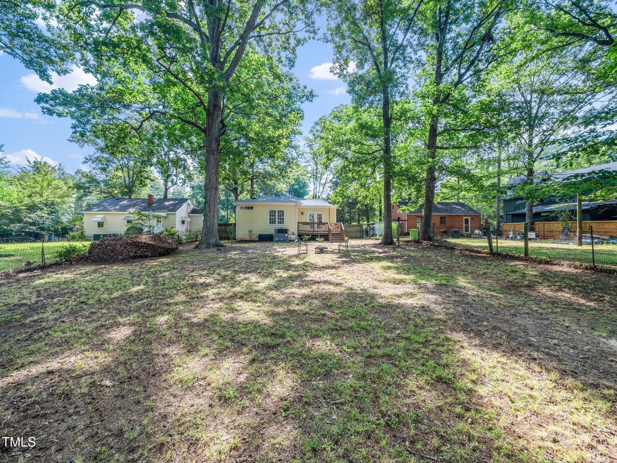 1825 Watkins Street Raleigh, NC 27604 - Photo 24 of 27 a view of a house with a yard