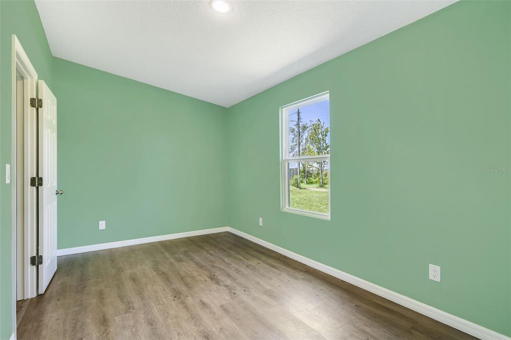 3380 Maple Lane Haines City, FL 33844 - Photo 19 of 28 a view of room with window and closet
