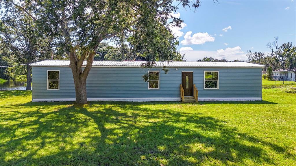 3380 Maple Lane Haines City, FL 33844 - Photo 26 of 28 a backyard of a house