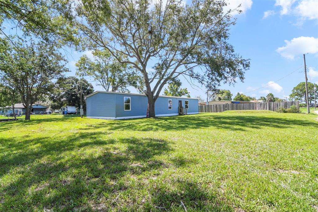 3380 Maple Lane Haines City, FL 33844 - Photo 3 of 28 a view of a house with a yard