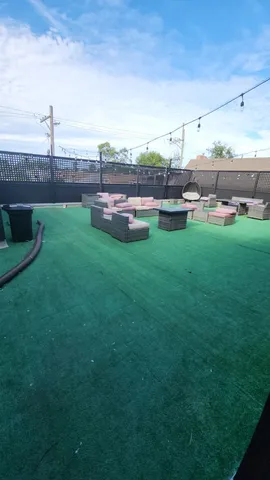 a view of a garden with an outdoor space