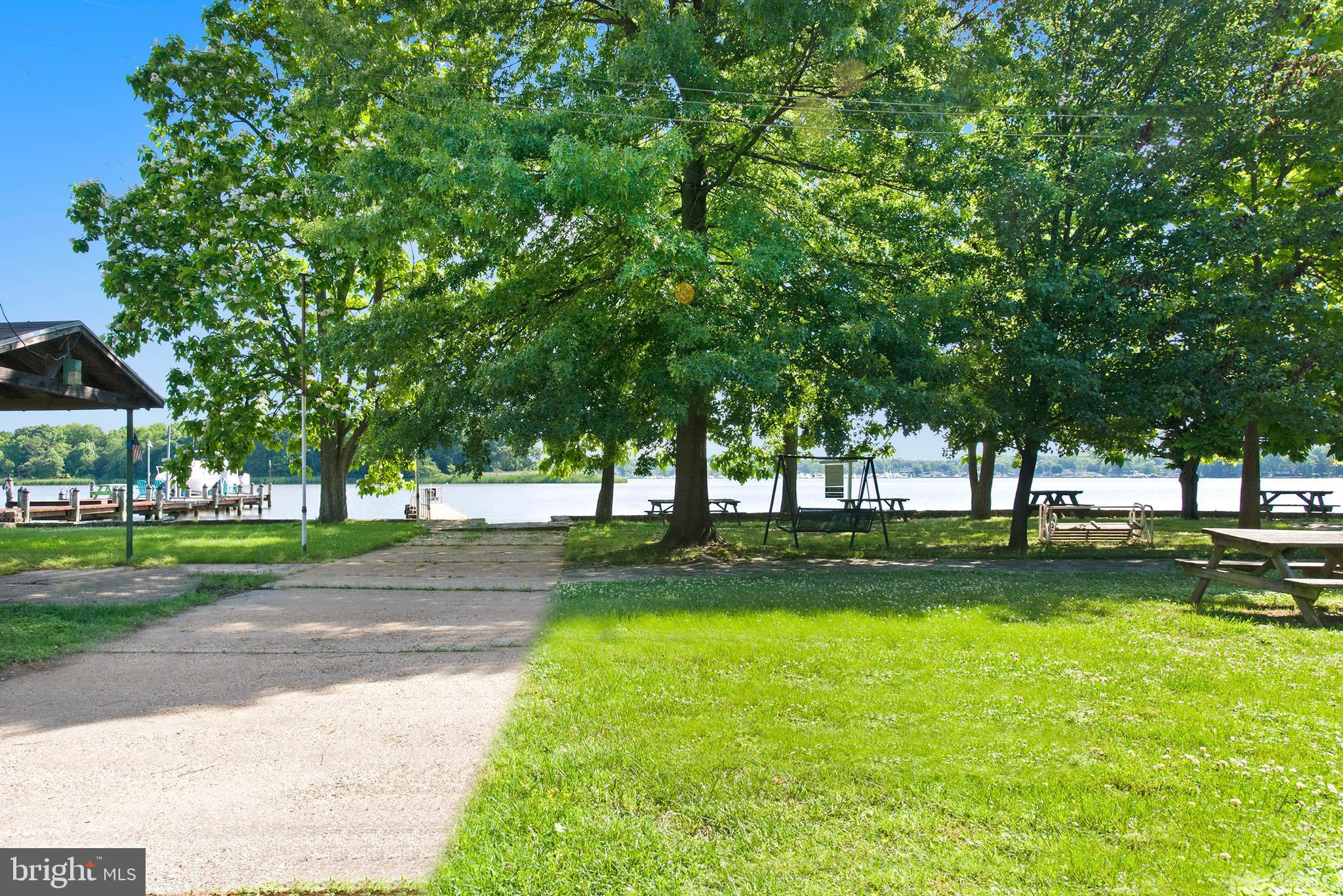 1903 Wilson Point Road Baltimore, MD 21220 - Photo 11 of 42 a view of a park with large trees