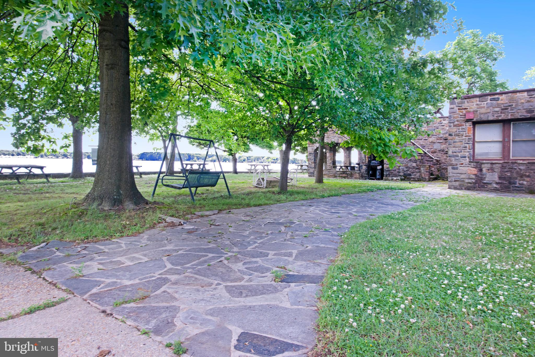 1903 Wilson Point Road Baltimore, MD 21220 - Photo 15 of 42 a view of a park with large trees