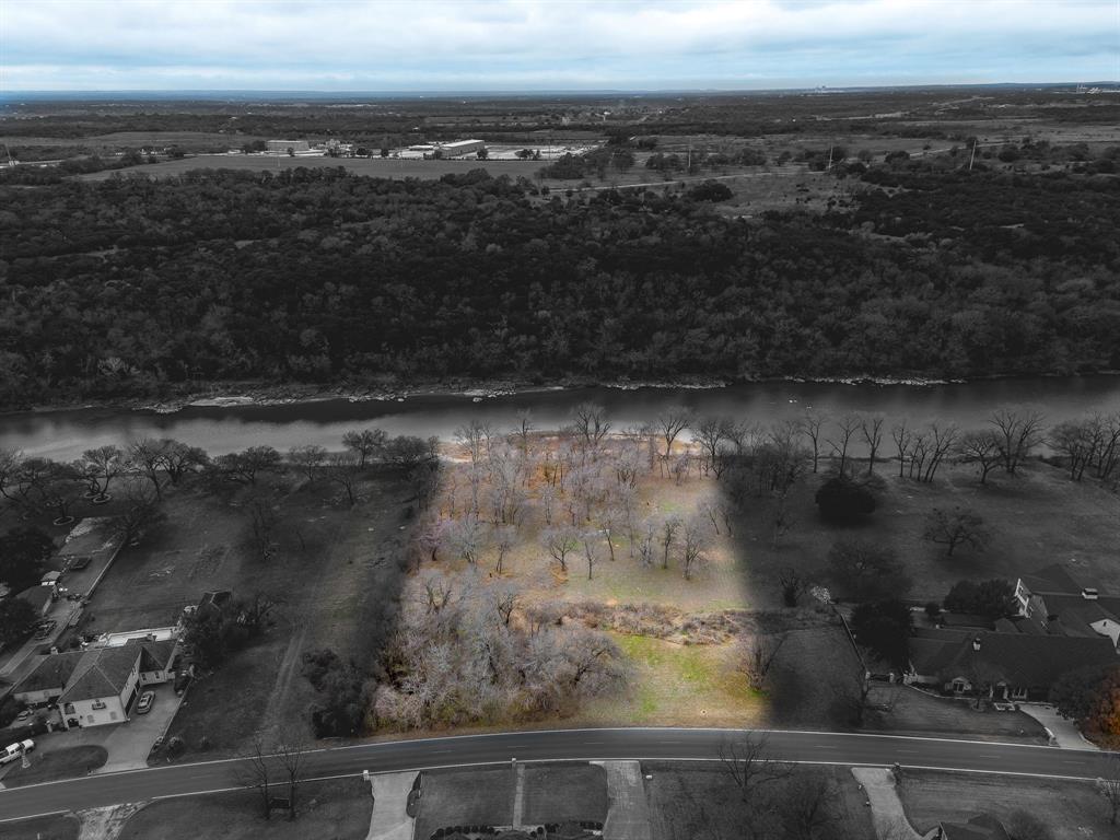 9314 Bellechase Road Granbury, TX 76049 - Photo 3 of 26 a view of a lake