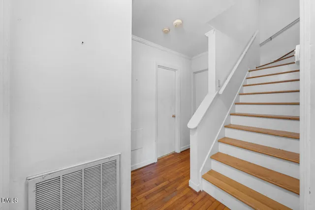a view of entryway with wooden floor