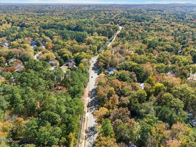 an aerial view of town with residential houses with outdoor space
