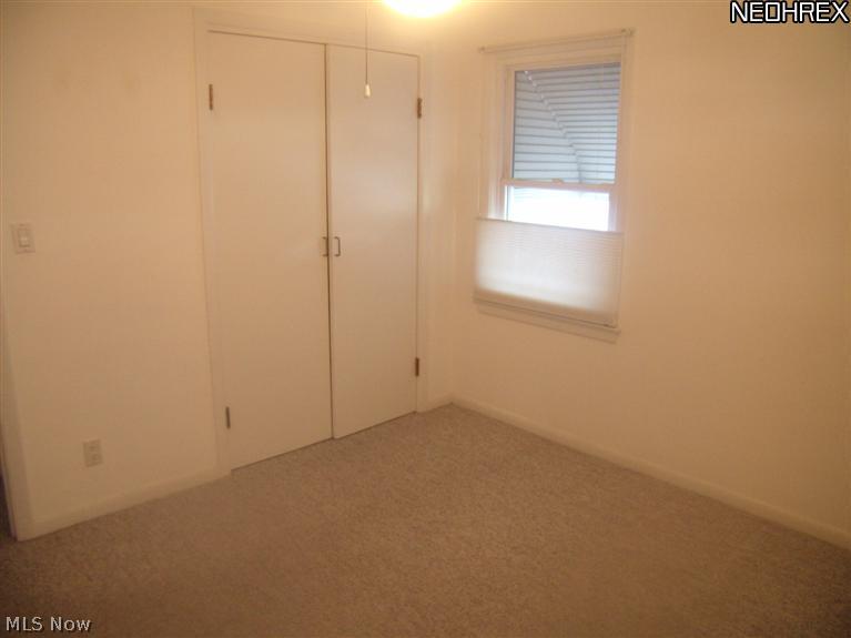 5958 Maplewood Road Cleveland, OH 44124 - Photo 16 of 24 bedroom on first floor, wood under carpet