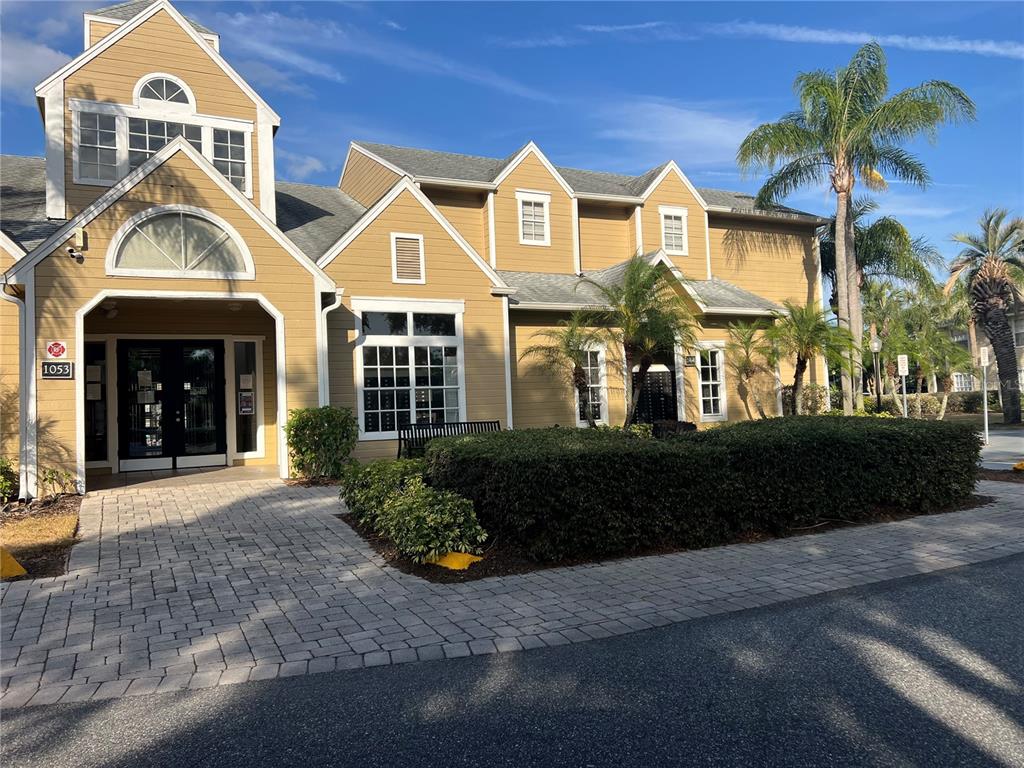 1065 South Hiawassee Road, Unit 1434 Orlando, FL 32835 - Photo 1 of 1 a front view of a house with a yard
