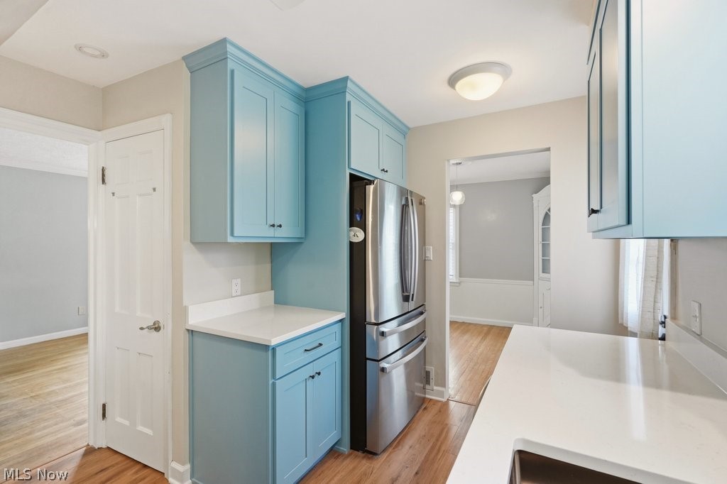 1379 Winston Road South Euclid, OH 44121 - Photo 11 of 30 New cabinets, quartz countertops and newer refrigerator.