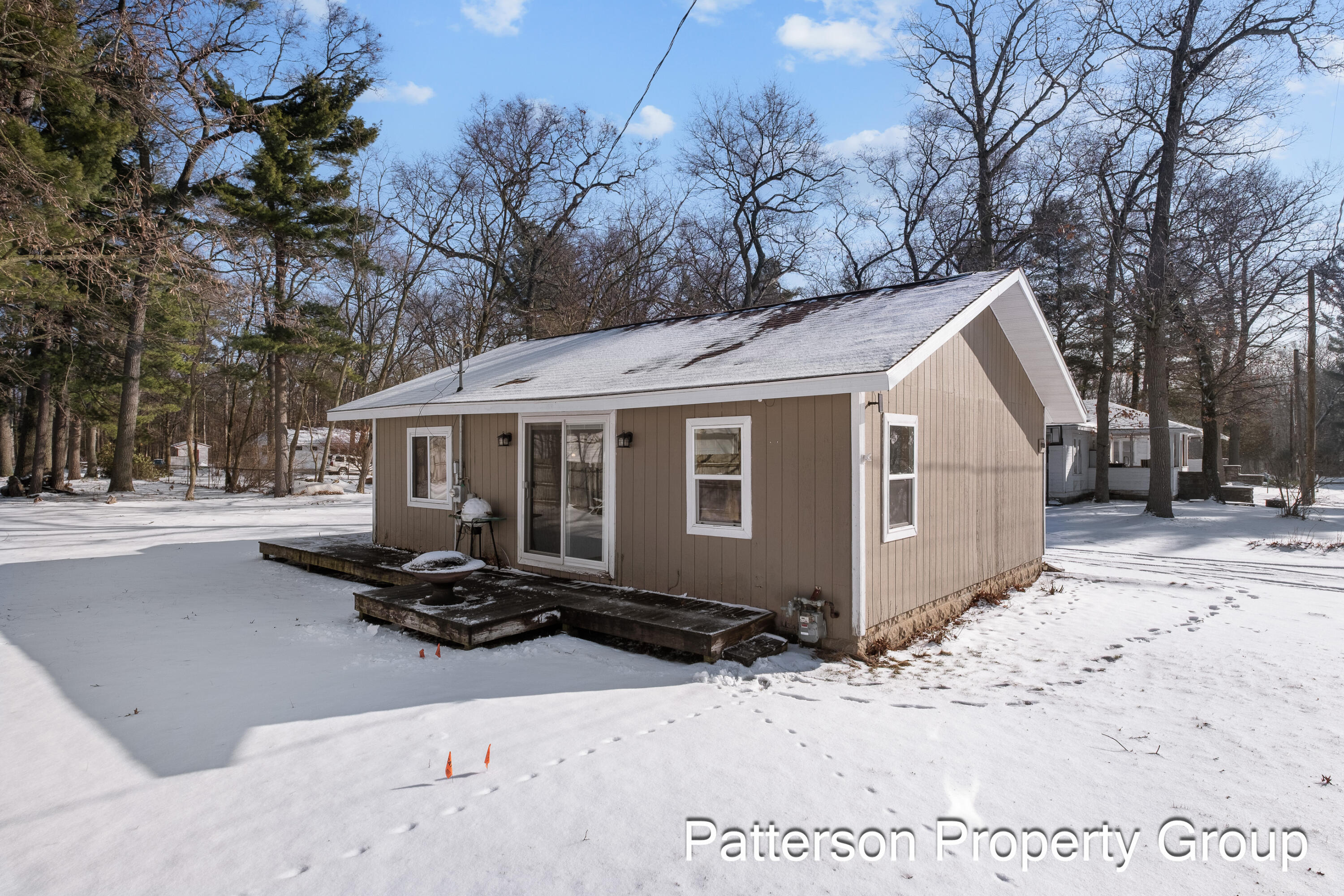 164 East Washington Road Twin Lake, MI 49457 - Photo 2 of 26 The back deck looking out at the lake