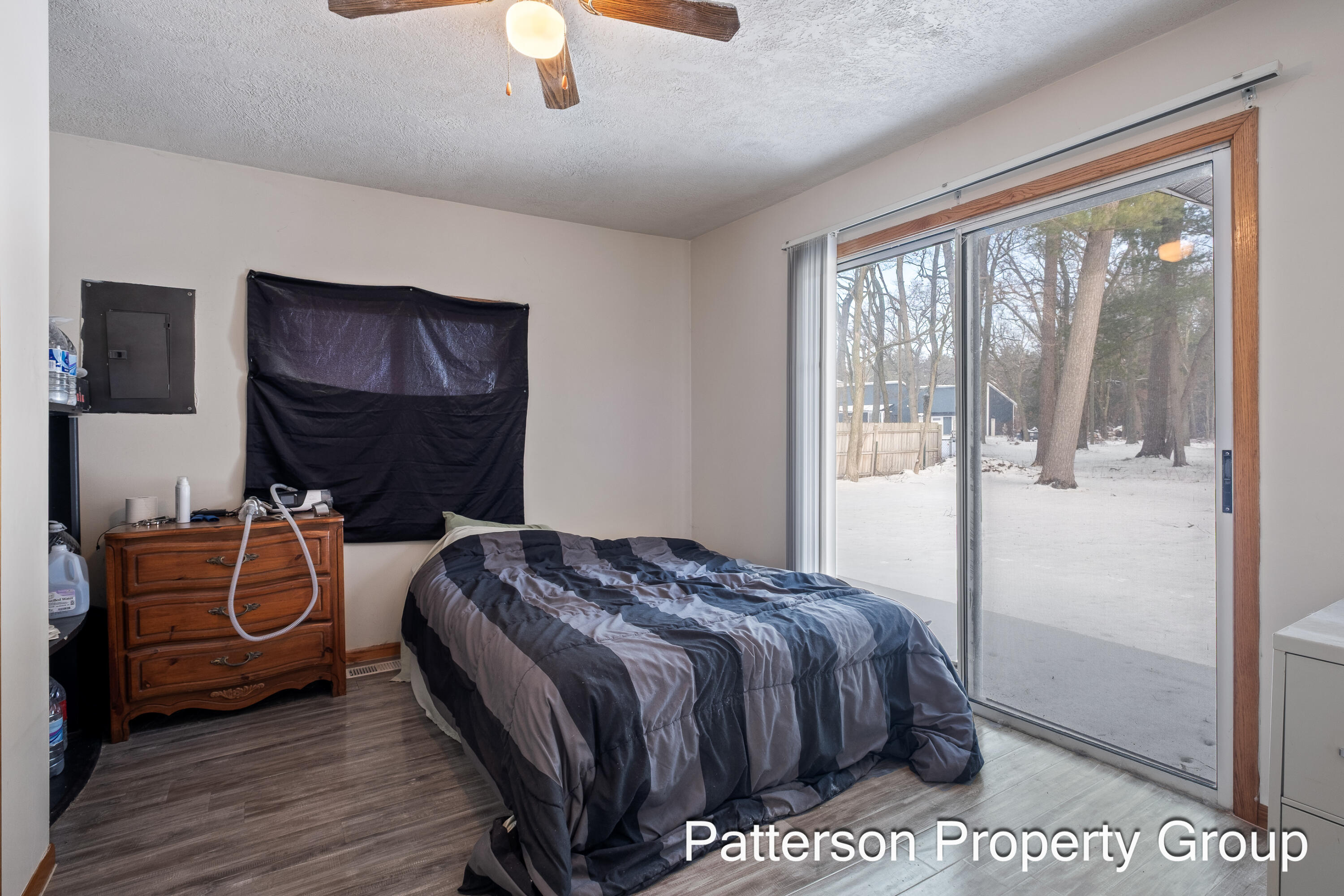 164 East Washington Road Twin Lake, MI 49457 - Photo 6 of 26 Primary Bedroom - slider to back porch