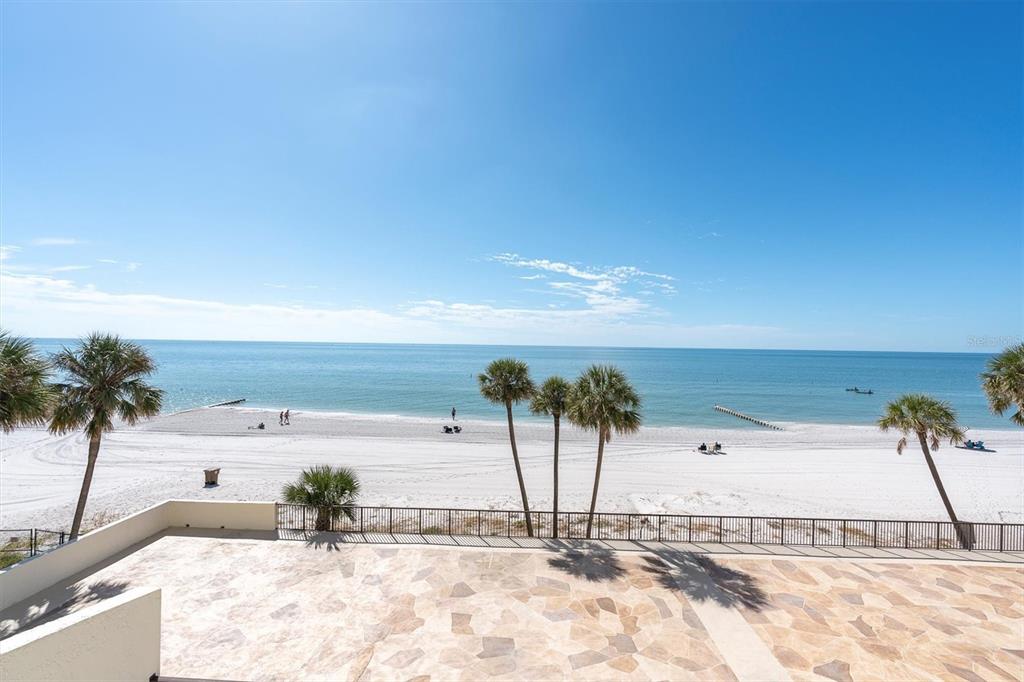 14950 Gulf Boulevard, Unit 402 Madeira Beach, FL 33708 - Photo 20 of 36 a view of a yard and ocean view