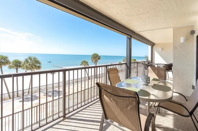 a hallway with windows and stairs