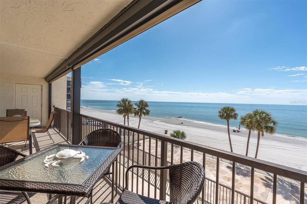 14950 Gulf Boulevard, Unit 402 Madeira Beach, FL 33708 - Photo 26 of 36 a view of balcony with furniture and stove