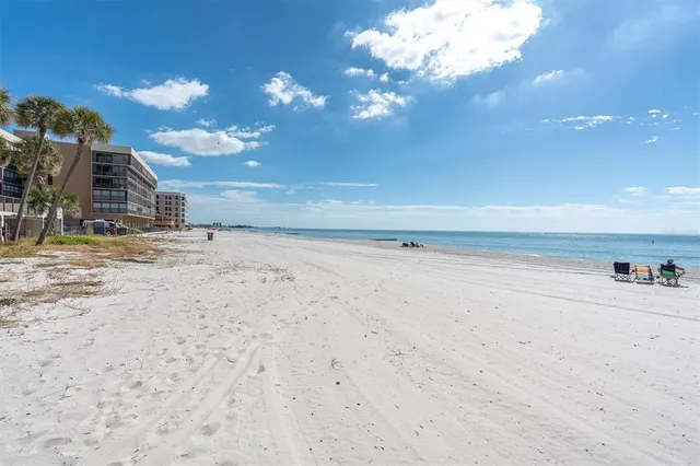 a view of a balcony with an ocean view