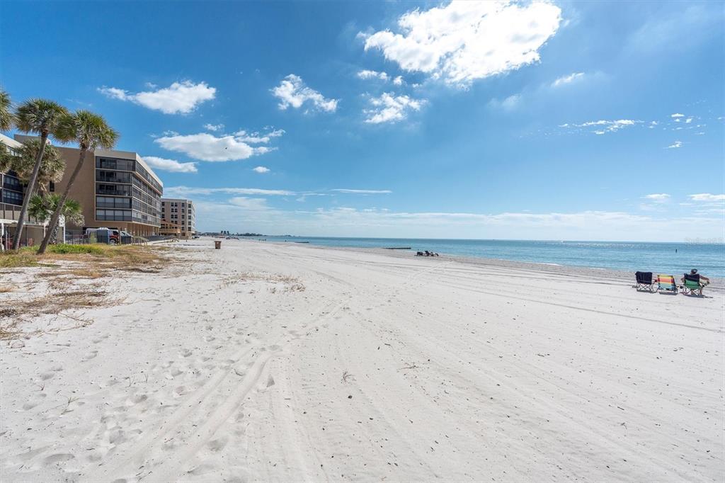 14950 Gulf Boulevard, Unit 402 Madeira Beach, FL 33708 - Photo 30 of 36 a view of the ocean and beach