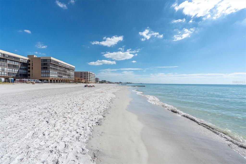 14950 Gulf Boulevard, Unit 402 Madeira Beach, FL 33708 - Photo 31 of 36 a view of a road with a building in the background