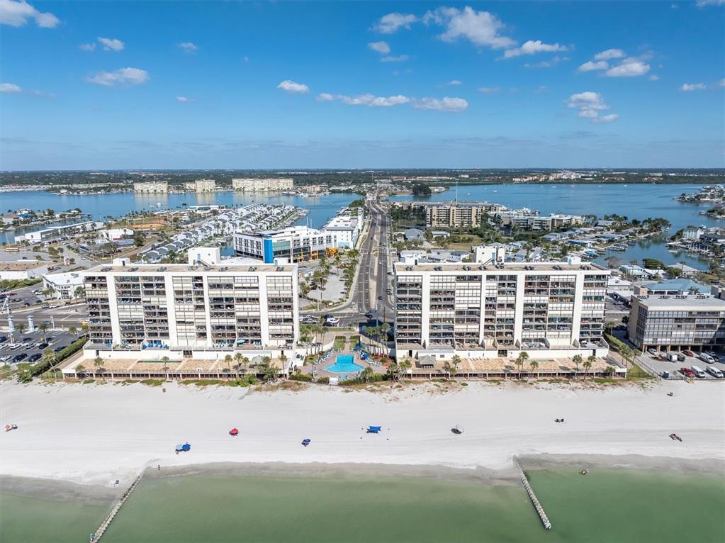 14950 Gulf Boulevard, Unit 402 Madeira Beach, FL 33708 - Photo 34 of 36 a view of building with an ocean view