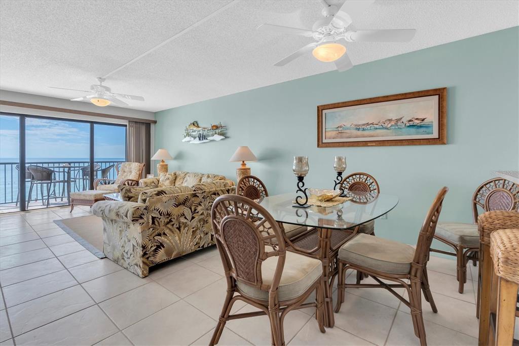 14950 Gulf Boulevard, Unit 402 Madeira Beach, FL 33708 - Photo 6 of 36 a view of a dining room with furniture