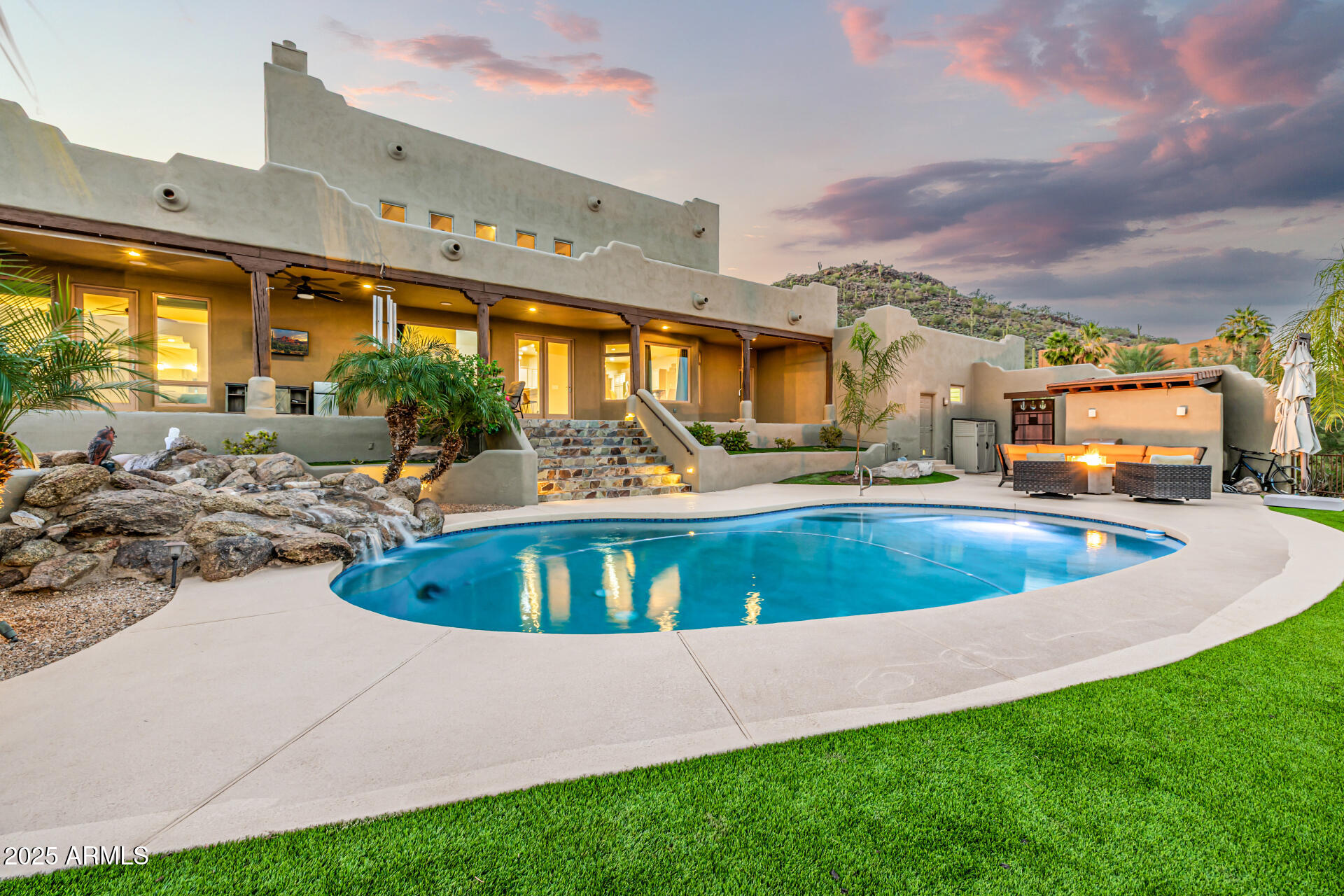 1815 West Sentinel Rock Road Phoenix, AZ 85086 - Photo 1 of 58 a view of swimming pool with a yard