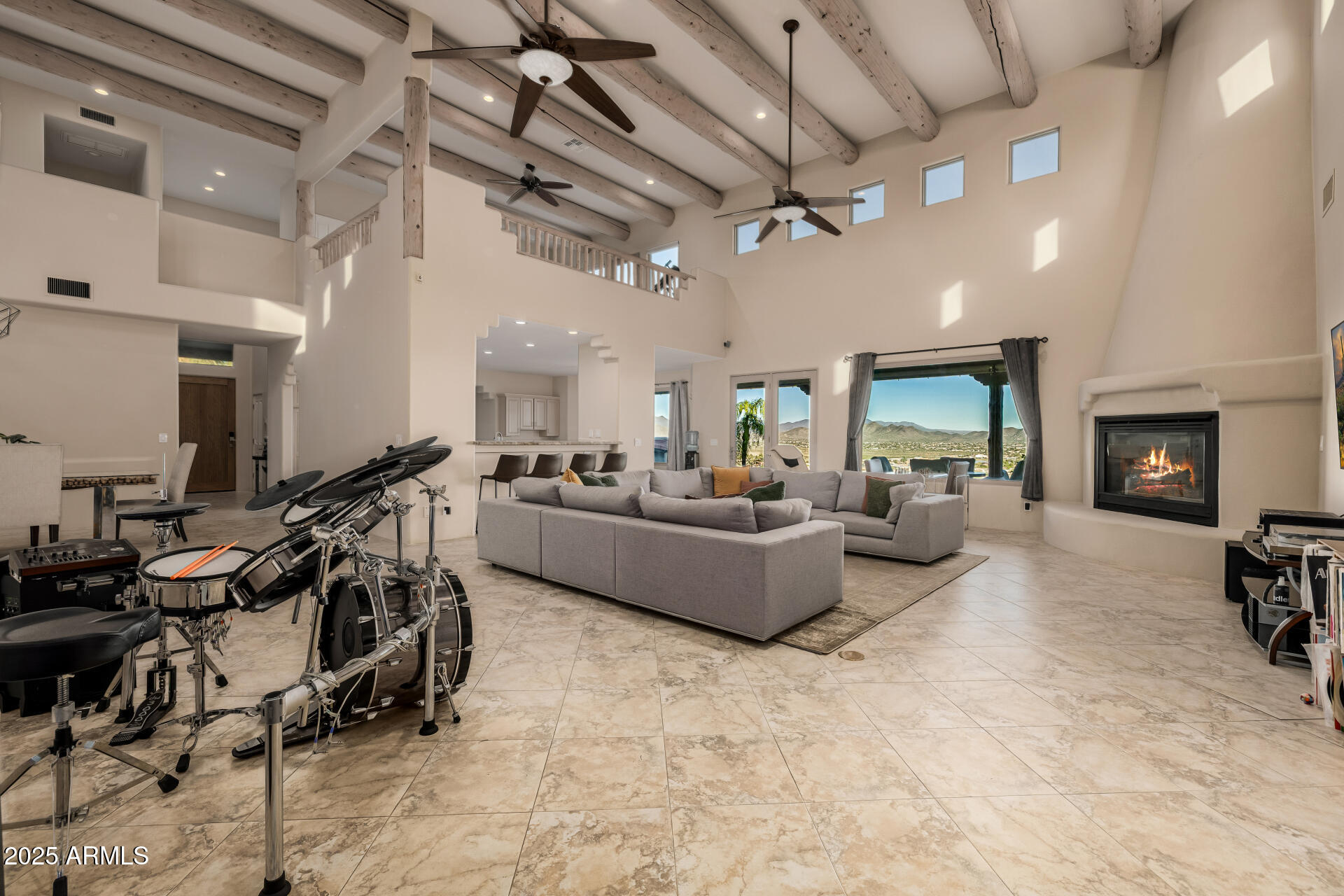 1815 West Sentinel Rock Road Phoenix, AZ 85086 - Photo 12 of 58 a living room with furniture and a fireplace