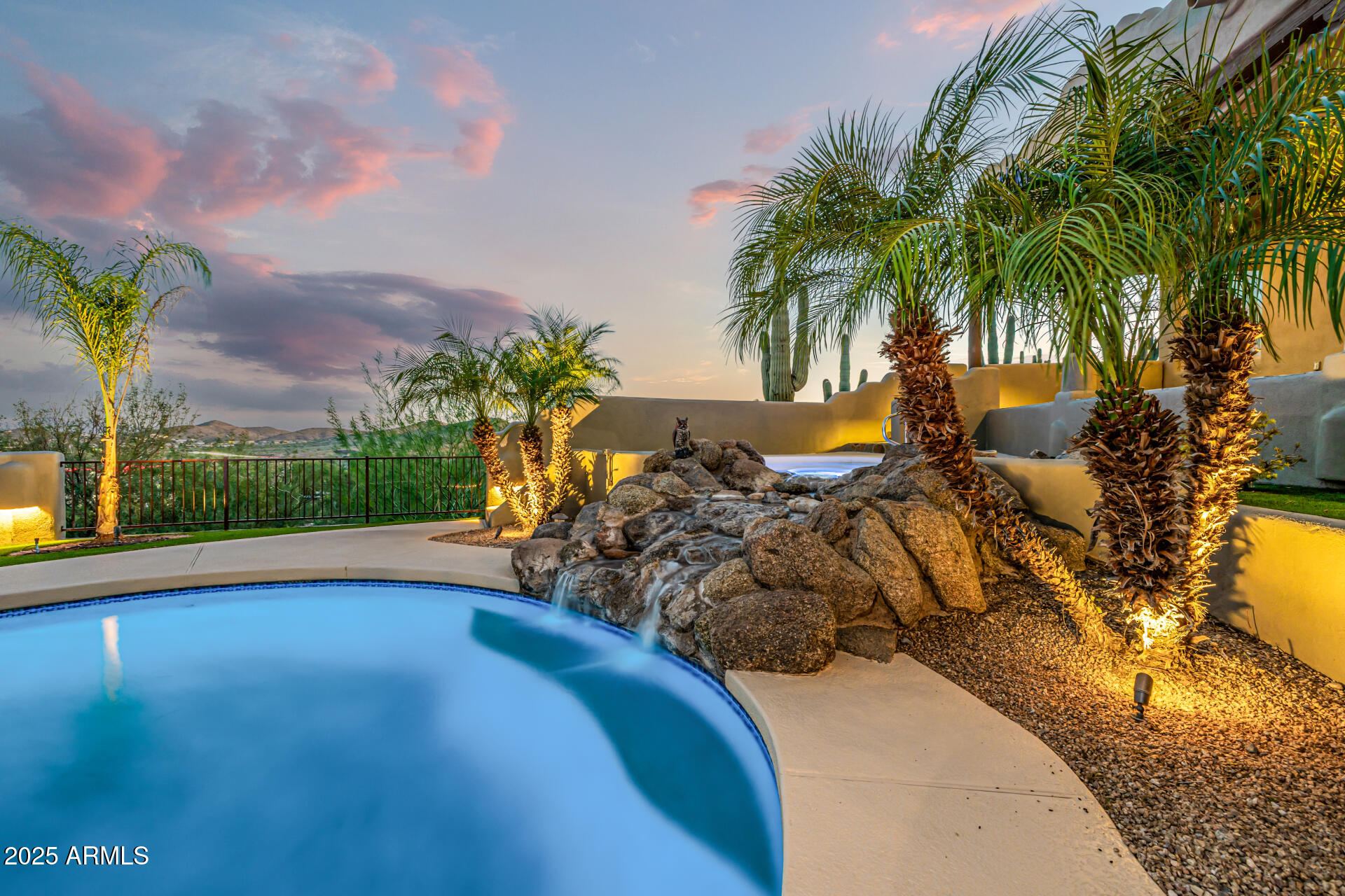 1815 West Sentinel Rock Road Phoenix, AZ 85086 - Photo 3 of 58 a view of swimming pool with a garden