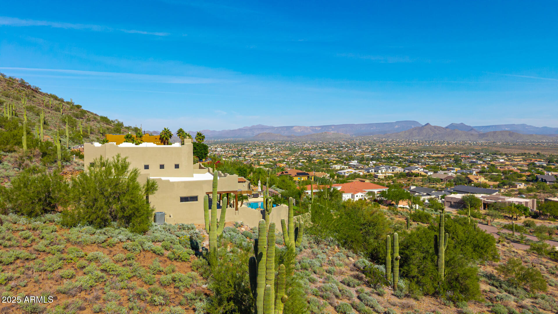 1815 West Sentinel Rock Road Phoenix, AZ 85086 - Photo 58 of 58 a view of a city with mountains in the background